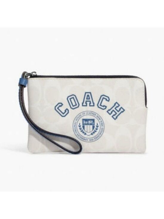 Coach Handbags - COACH SIGNATURE CANVAS CORNER ZIP WRISTLET CHALK INDIGO
